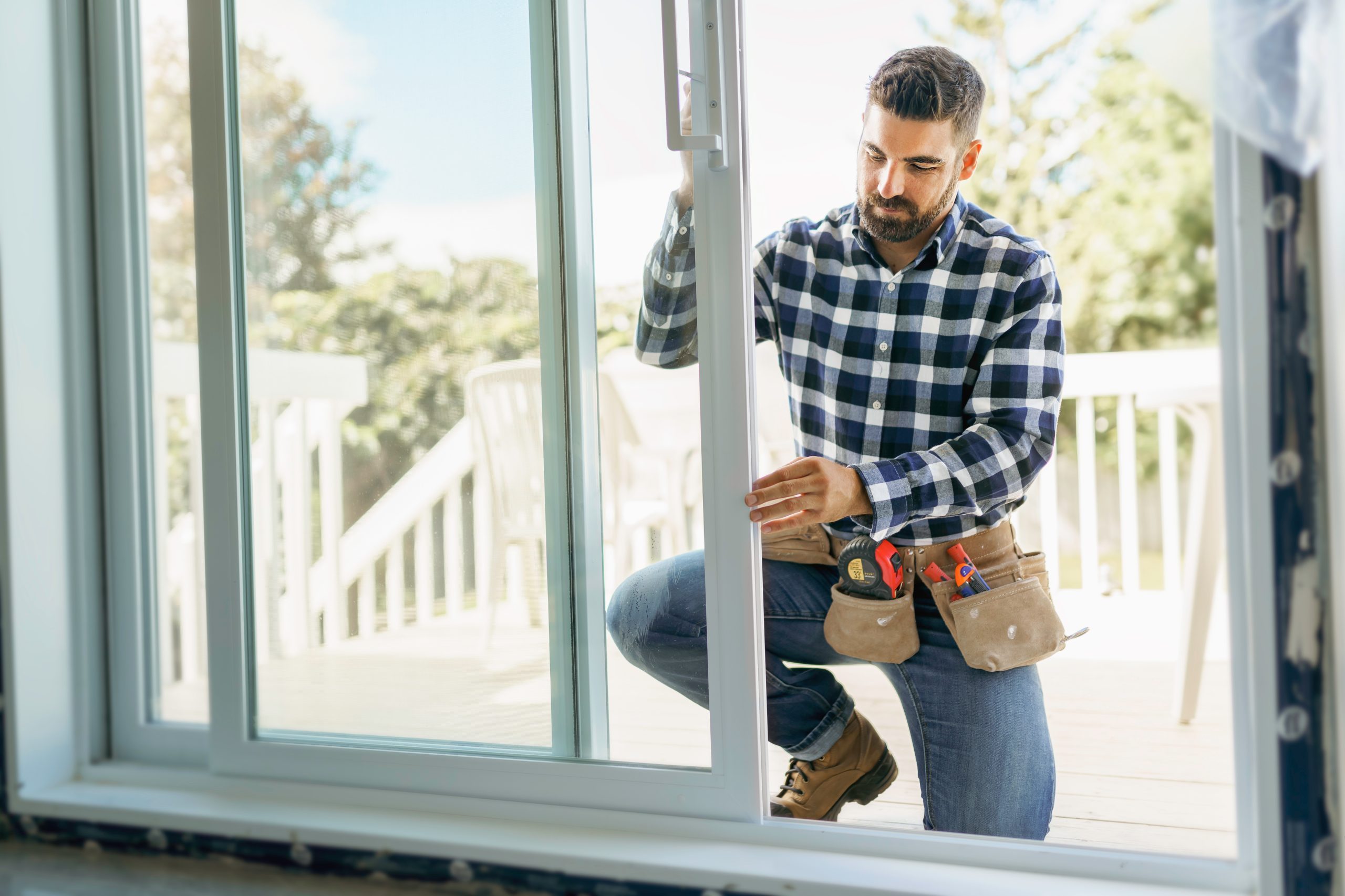 hurricane certified windows being installed by service professional from The Window Experts