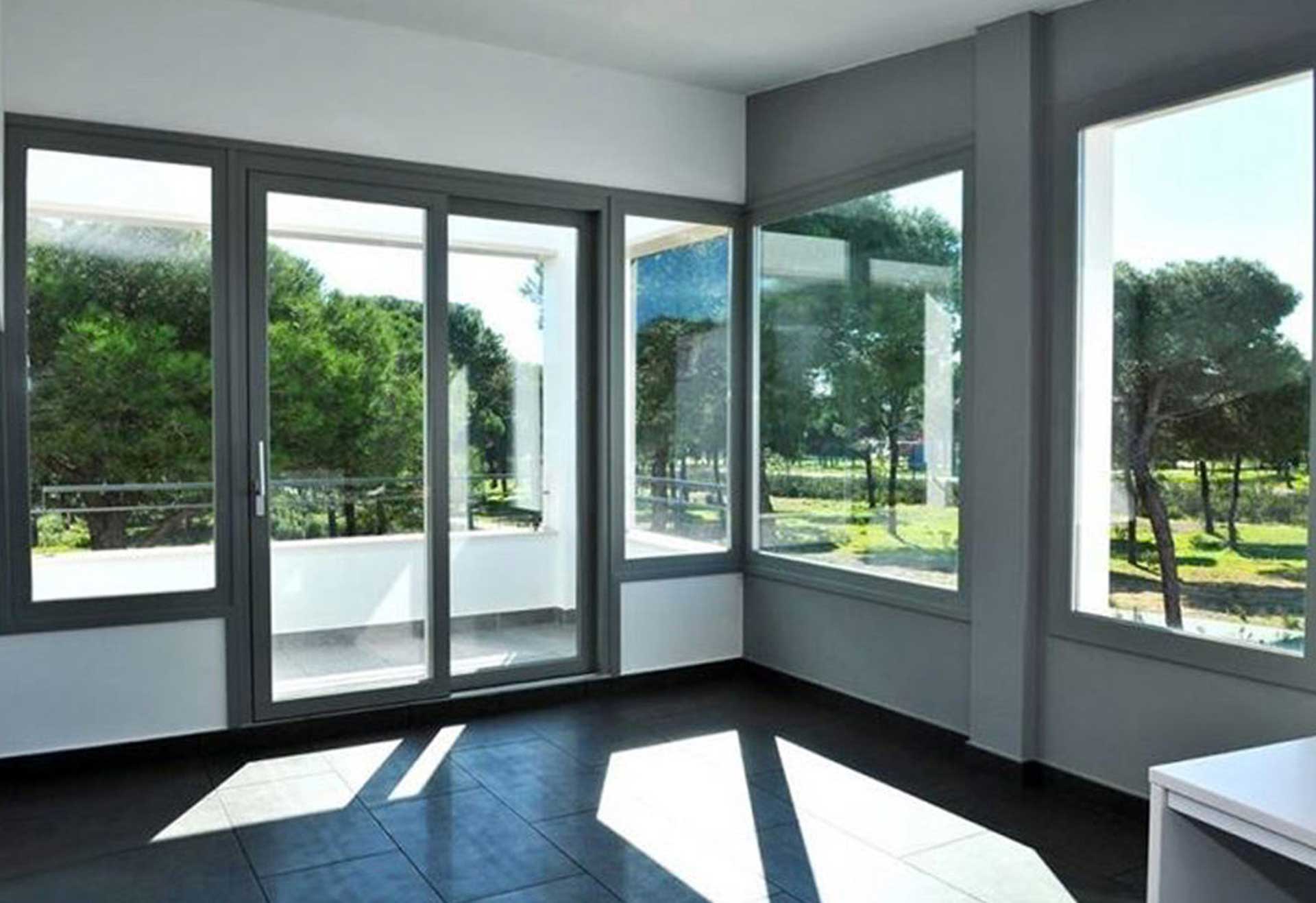 A home with hurricane impact sliding doors. Impact sliding doors concept image